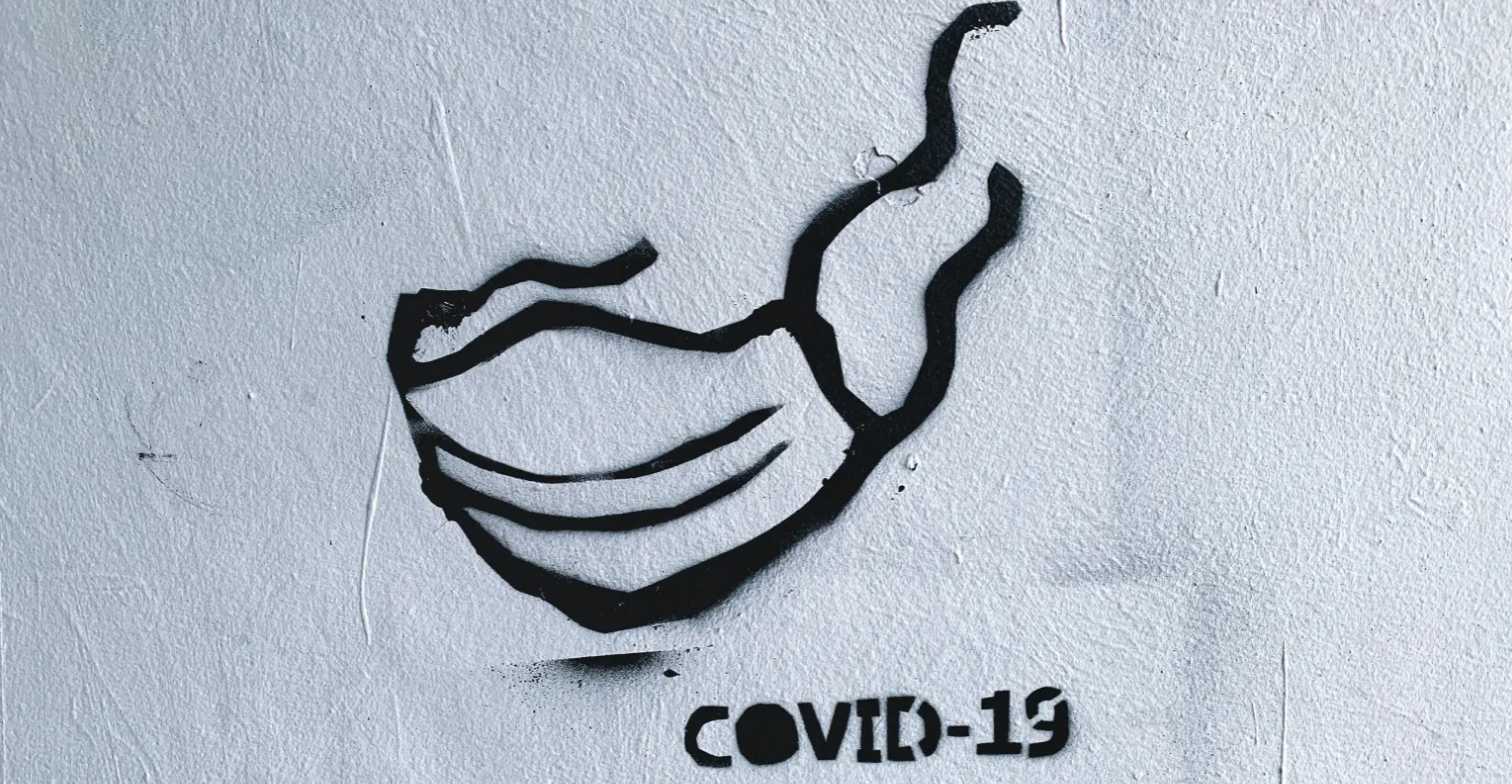 Graffiti einer Corona-Maske